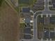 Overhead view showcases the backyard and neighborhood layout of the home's location at 1341 Mattie Pointe Blvd, Auburndale, FL 33823