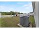 Expansive backyard featuring a play set, lush green grass and partial fencing at 1341 Mattie Pointe Blvd, Auburndale, FL 33823