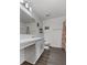 Clean bathroom with modern vanity, toilet, and stylish shower curtain at 1341 Mattie Pointe Blvd, Auburndale, FL 33823