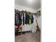 Walk-in closet with organized storage for clothes and shoes at 1341 Mattie Pointe Blvd, Auburndale, FL 33823