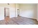 Open bedroom with an attached bath and large closet space at 13650 Sw 43Rd Cir, Ocala, FL 34473