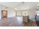 Spacious open floor plan, connecting the kitchen to the living area at 13650 Sw 43Rd Cir, Ocala, FL 34473