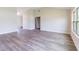 Open-concept living room with stylish floors, bright and spacious at 13650 Sw 43Rd Cir, Ocala, FL 34473