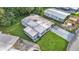 Wonderful single Gathering home on a beautifully landscaped lot, showcasing lawn and roof at 1610 Reynolds Rd # 50, Lakeland, FL 33801