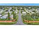 An aerial view of a mobile home community showcasing the well-maintained landscaping and streets at 1610 Reynolds Rd # 50, Lakeland, FL 33801