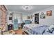 Cozy bedroom featuring a blue patterned bedspread, matching dressers, and a closet at 1610 Reynolds Rd # 50, Lakeland, FL 33801