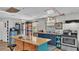 Functional kitchen with stainless steel appliances, wooden countertops, and ample storage for culinary enthusiasts at 1610 Reynolds Rd # 50, Lakeland, FL 33801