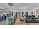 Open-concept layout with an island, seating area, and natural light, creating a cozy atmosphere at 1610 Reynolds Rd # 50, Lakeland, FL 33801