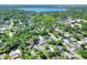 An aerial view highlights this home's location in a mature community with lush green space at 1655 John Arthur Way, Lakeland, FL 33803