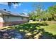 Well-maintained backyard with lush green grass and privacy fence, offering a serene outdoor space at 1655 John Arthur Way, Lakeland, FL 33803