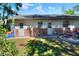 Backyard with patio and partial privacy fence at 1655 John Arthur Way, Lakeland, FL 33803