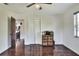 Bedroom with hardwood floors and bright natural light at 1655 John Arthur Way, Lakeland, FL 33803