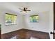 Bedroom with hardwood floors and bright natural light at 1655 John Arthur Way, Lakeland, FL 33803