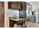 Bright eat-in kitchen with granite countertops, refrigerator, and dining space at 1655 John Arthur Way, Lakeland, FL 33803