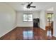 Open living room featuring hardwood floors and natural light at 1655 John Arthur Way, Lakeland, FL 33803