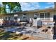 Charming patio with brick pavers, outdoor seating, and a grill perfect for relaxation and entertaining at 1655 John Arthur Way, Lakeland, FL 33803
