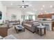 Bright and airy living room with modern furnishings, neutral tones, and an open layout at 1757 Burrows Ave, Lakeland, FL 33811