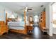 Comfortable bedroom with natural wood furniture and light blue decorative accents offering a serene and relaxing space at 1931 Matthew Ct, Lakeland, FL 33813