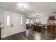 Spacious foyer with wood floors and a view into the dining area at 1931 Matthew Ct, Lakeland, FL 33813