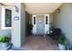 Inviting front entrance showcasing a decorative door with sidelights and neutral color palette at 1931 Matthew Ct, Lakeland, FL 33813