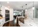 Bright, modern kitchen with updated stainless steel appliances and convenient island seating at 1931 Matthew Ct, Lakeland, FL 33813