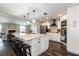 Modern kitchen with large island, pendant lighting, stainless steel appliances, and ample counter space at 1931 Matthew Ct, Lakeland, FL 33813