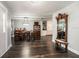 Open floor plan with hardwood floors that flows seamlessly from the entry to the dining room at 1931 Matthew Ct, Lakeland, FL 33813