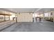 View of the expansive carport showing storage area and exterior décor at 2104 W End Ave, Lakeland, FL 33803