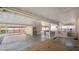 Spacious carport leading to a wood deck and various outdoor living areas at 2104 W End Ave, Lakeland, FL 33803