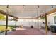 Outdoor patio featuring brick pavers, overhead lighting, and white picket fence at 2104 W End Ave, Lakeland, FL 33803