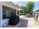 View of backyard with a screen-enclosed porch with a pool visible and brick pavers at 221 Stevenson Rd, Winter Haven, FL 33884