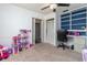 Bedroom features carpet floors, white trim, and large closet at 221 Stevenson Rd, Winter Haven, FL 33884