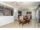 Dining room with tile floors and view to living spaces at 221 Stevenson Rd, Winter Haven, FL 33884
