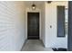 Close-up of the home's elegant front door, with its classic design and welcoming ambiance at 221 Stevenson Rd, Winter Haven, FL 33884