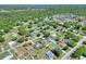 This image shows the home's location in a mature, tree-covered neighborhood at 2329 Duff Rd, Lakeland, FL 33810