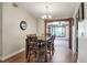 Cozy dining room with a wooden table set, elegant lighting, and an inviting ambiance at 2329 Duff Rd, Lakeland, FL 33810