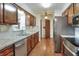 Well-equipped kitchen with stainless steel appliances, stylish countertops, and ample cabinet space at 2329 Duff Rd, Lakeland, FL 33810