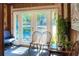 Sun-filled sitting area with glass doors, comfortable seating, and views of the outdoors at 2329 Duff Rd, Lakeland, FL 33810
