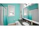 Bright bathroom featuring a tile floor, granite counters, and colorful paint at 2569 Colonel Ford Dr, Lakeland, FL 33813
