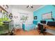 Bedroom featuring a desk, a swing chair, and an aquarium at 2569 Colonel Ford Dr, Lakeland, FL 33813
