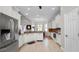 Spacious kitchen featuring stainless steel appliances, granite countertops, and ample cabinet space for cooking convenience at 2569 Colonel Ford Dr, Lakeland, FL 33813