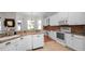 Well-equipped kitchen boasting granite countertops, stainless steel appliances, and a breakfast bar for casual dining at 2569 Colonel Ford Dr, Lakeland, FL 33813