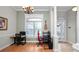 Bright home office space with hardwood floors, large window, and modern desks at 2569 Colonel Ford Dr, Lakeland, FL 33813