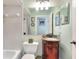 This cozy bathroom features a vanity with marble countertops at 2653 State Road 557, Lake Alfred, FL 33850