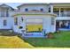 Charming home featuring an enclosed patio overlooking a beautiful yard and reflective sliding glass doors at 2653 State Road 557, Lake Alfred, FL 33850