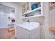Functional laundry room with modern washer and dryer and ample storage space at 2816 Fairmount Ave, Lakeland, FL 33803