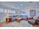 Comfortable living room with plush seating, wood accents, and natural light at 2816 Fairmount Ave, Lakeland, FL 33803