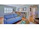 Inviting living room with hardwood floors, natural light, and cozy furniture arrangement at 2816 Fairmount Ave, Lakeland, FL 33803