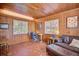 Cozy office space featuring wood-paneled walls and a comfortable seating area at 2816 Fairmount Ave, Lakeland, FL 33803