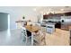 Bright dining area with tile floors, wood table, and an open view into the kitchen at 2929 Flying Blackbird Rd, Bartow, FL 33830